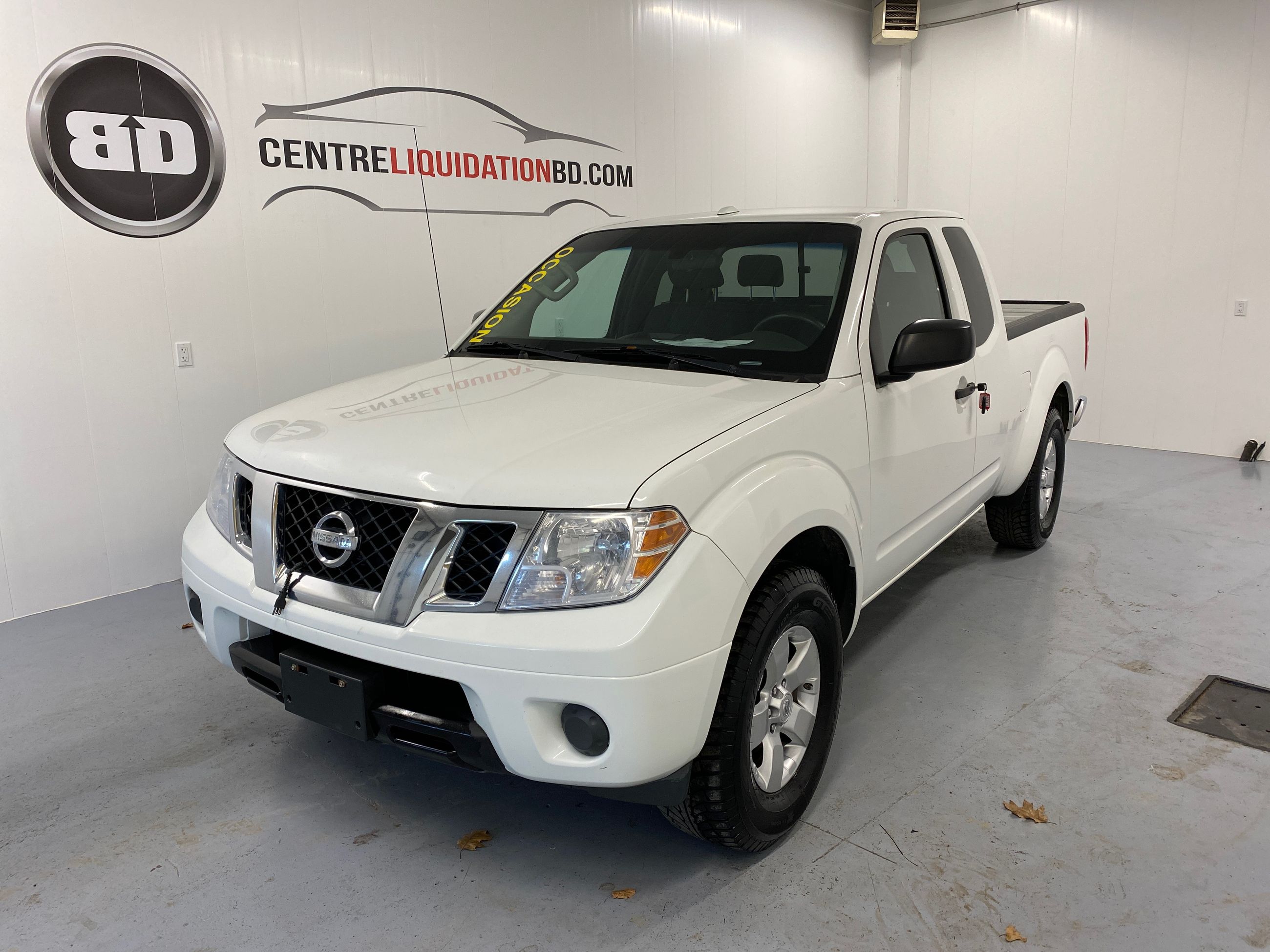 Centre de Liquidation BD Nissan Frontier SV + AIR CLIM + AUTOMATIQUE