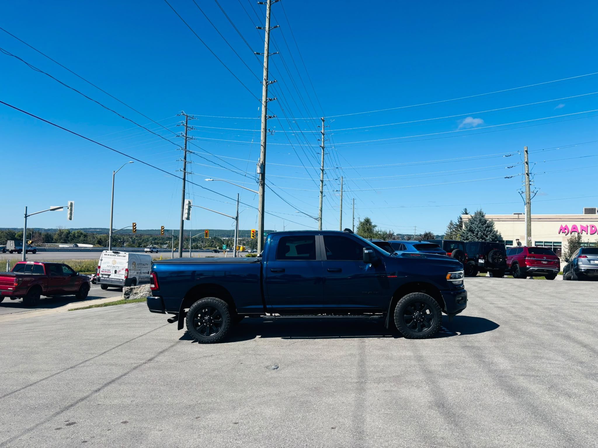 Photo 2023 Ram RAM 2500 Crew Cab 4x4 Laramie (149 WB 6'4 Box) #4