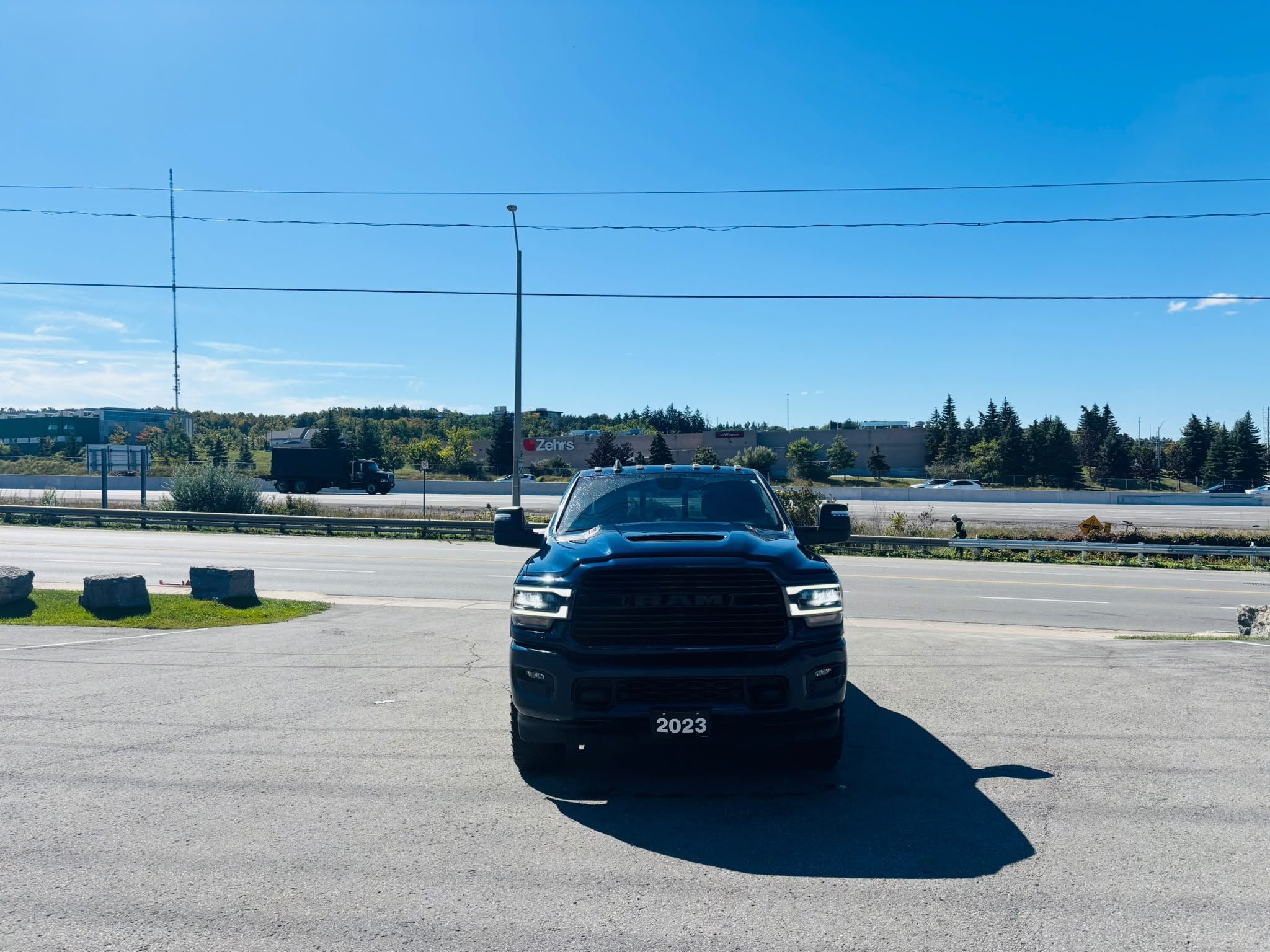Photo 2023 Ram RAM 2500 Crew Cab 4x4 Laramie (149 WB 6'4 Box) #2