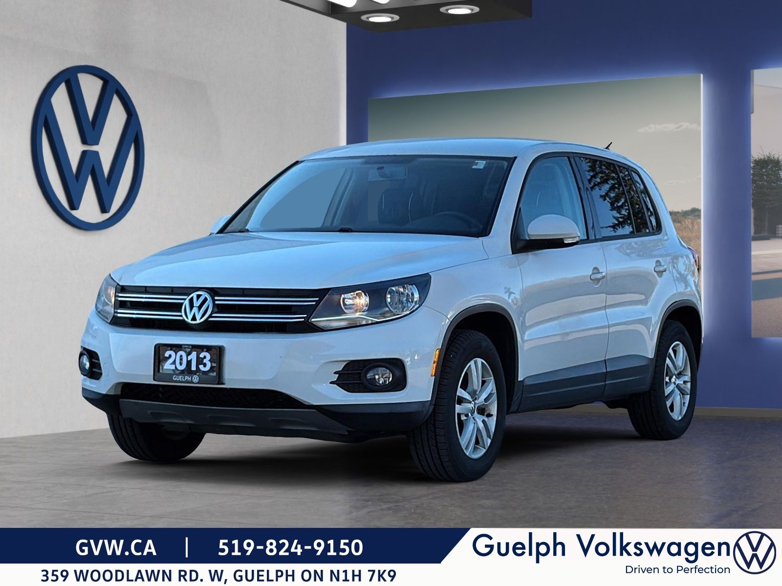 Photo Volkswagen TIGUAN 2.0T TRENDLINE 2013 #1