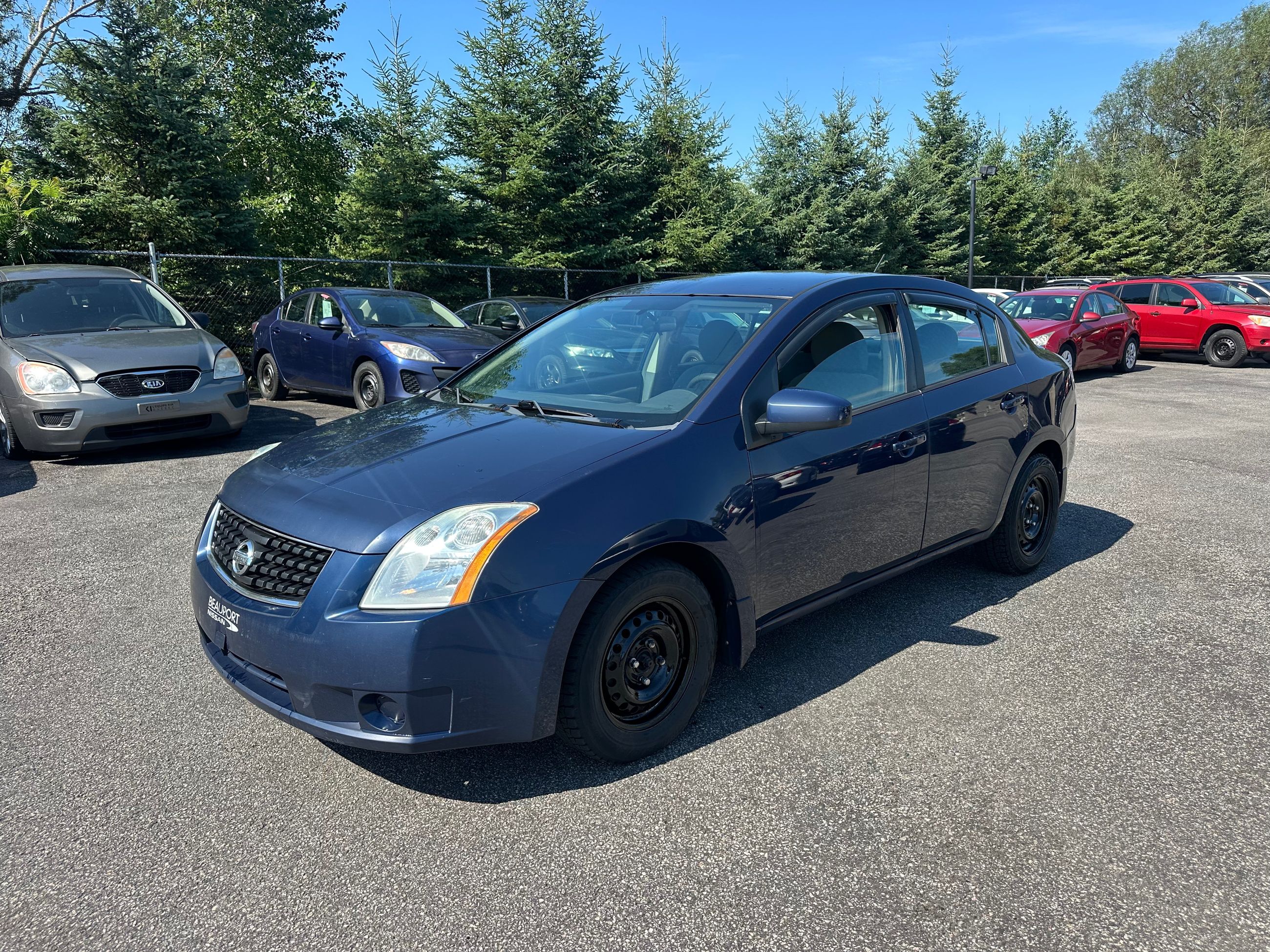 Nissan Sentra 2009 — photo 2