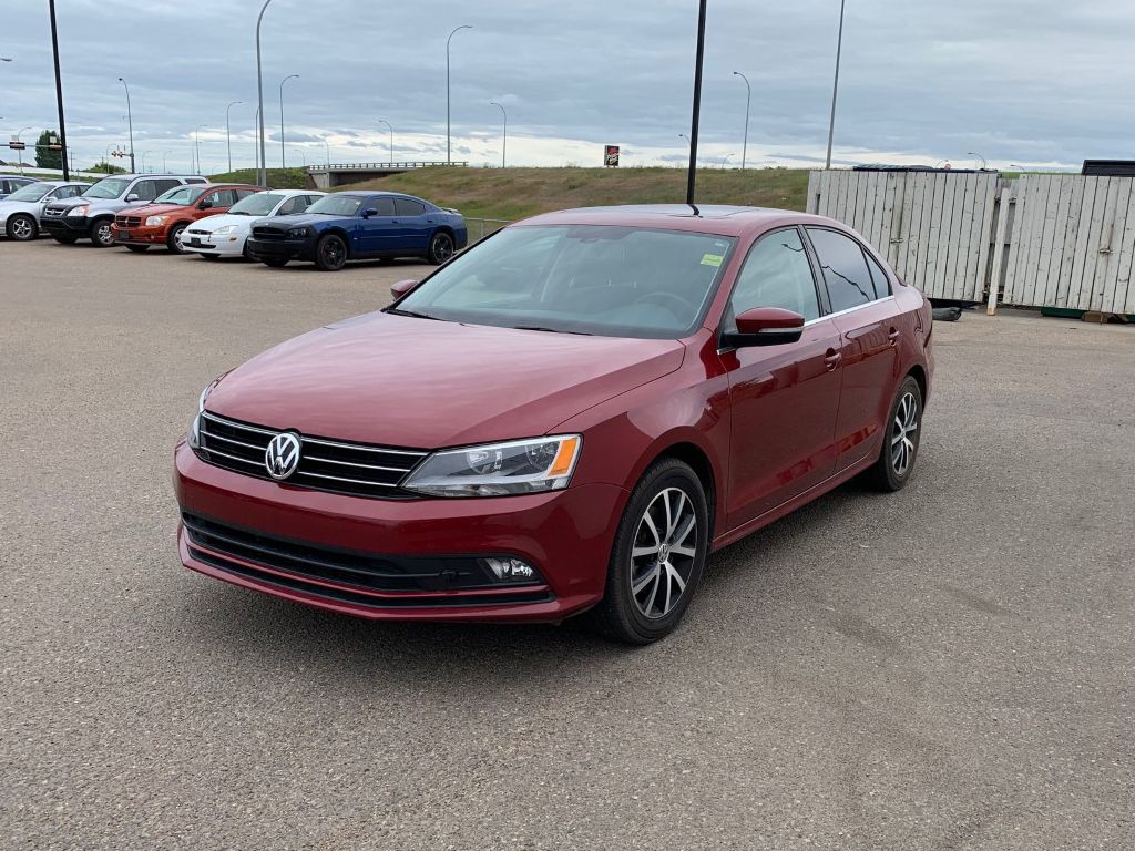 Used 2016 Volkswagen Jetta Sedan 1.4 TSI Comfortline w/ SUNROOF Ruby Red Metallic 84,017 KM for