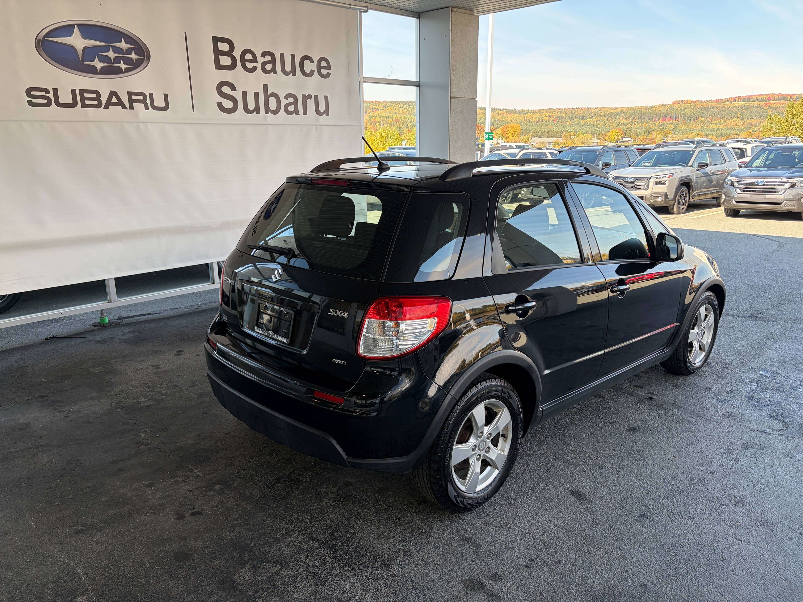 Photo 2011 Suzuki SX4 JX #3