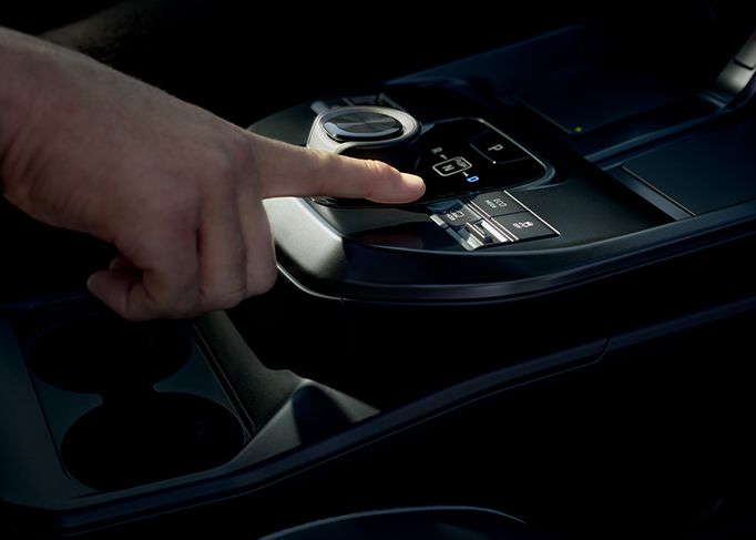 Aerial view of three cars on a winding road, demonstrating active safety and distance sensors.