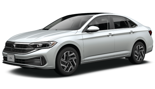 A white Volkswagen Jetta sedan with a black roof and silver alloy wheels.