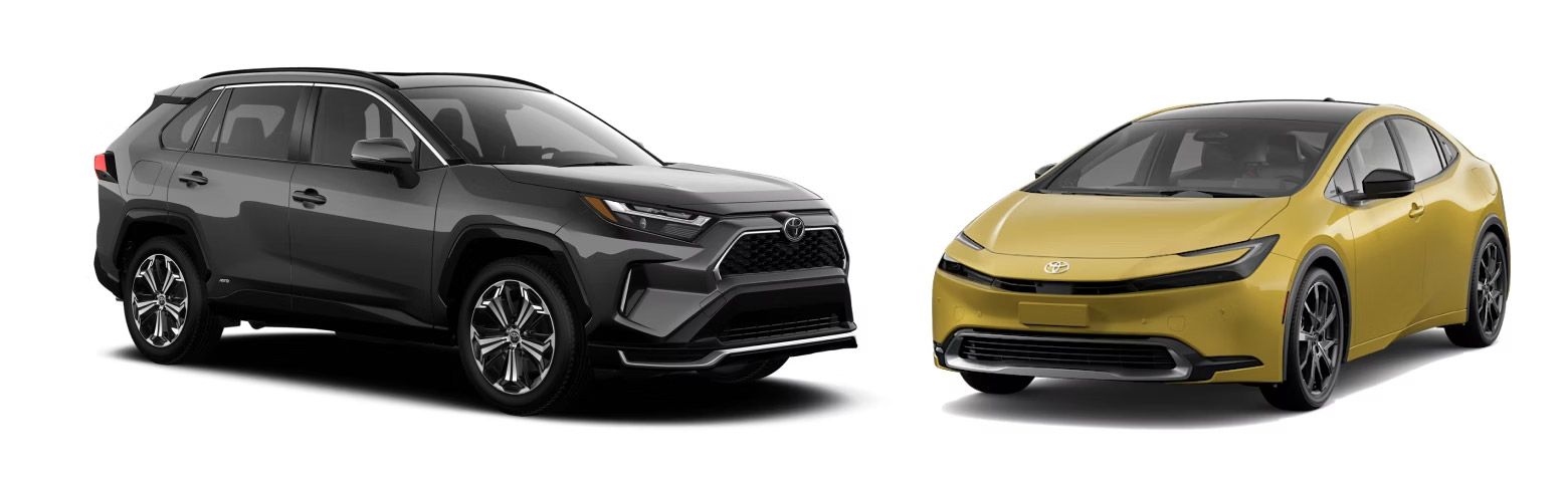  A studio shot shows two Toyota vehicles side-by-side on a white background. On the left is a dark gray Toyota RAV4. On the right is a mustard yellow Toyota Prius.