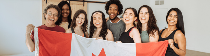 A white sedan speeds down a road, with blue motion blur effects.