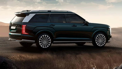 View from inside a car's driver's seat while driving through a tunnel at night, showing light trails.