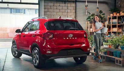 Aerial view of three cars on a winding road, demonstrating active safety and distance sensors.
