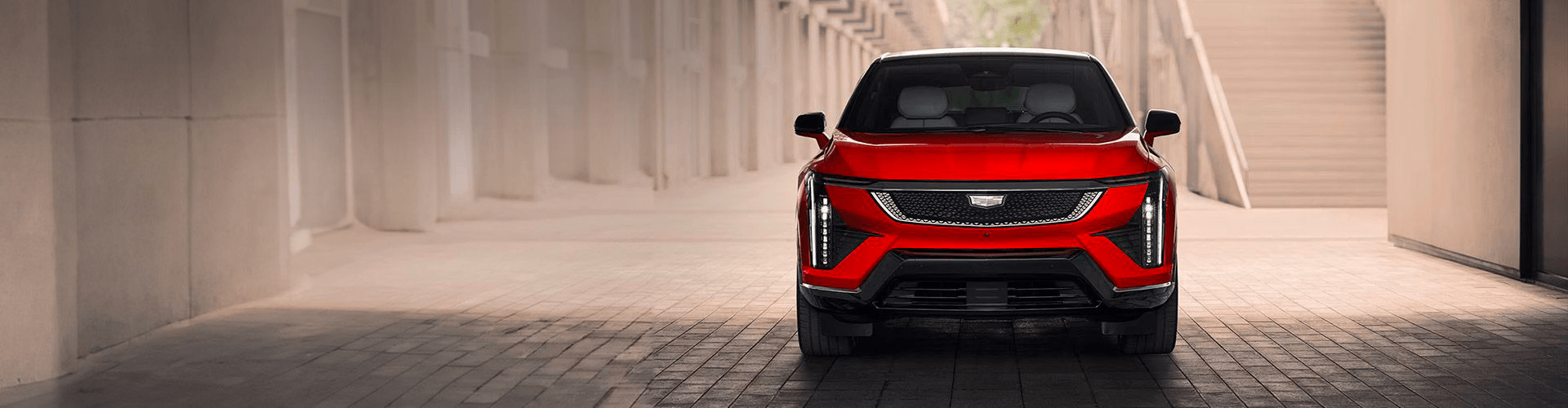 Vue avant du nouveau Cadillac OPTIQ 2026 rouge