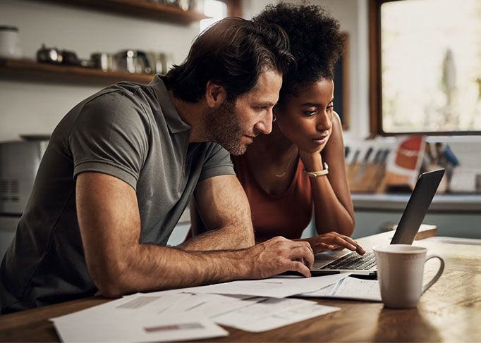 couple looking at computer