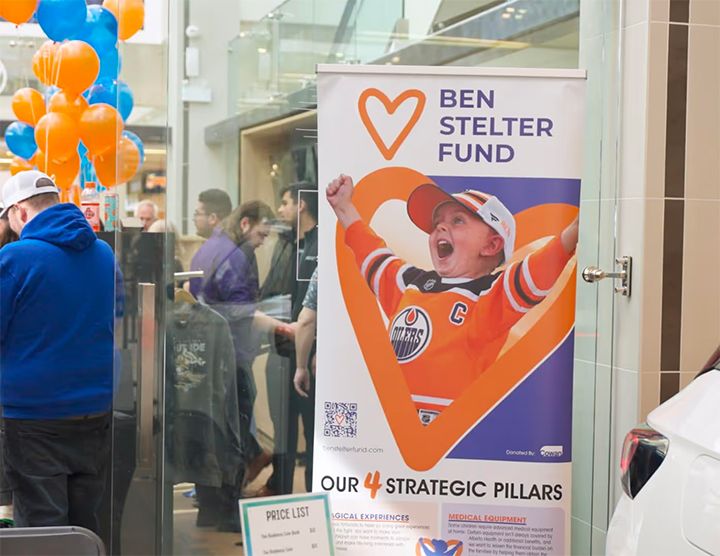 A vertical banner for the Ben Stelter Fund features a joyful photo of Ben Stelter in an Oilers jersey, surrounded by a large orange heart. The banner lists "Our 4 Strategic Pillars" at the bottom, including "Magical Experiences" and "Medical Equipment."
