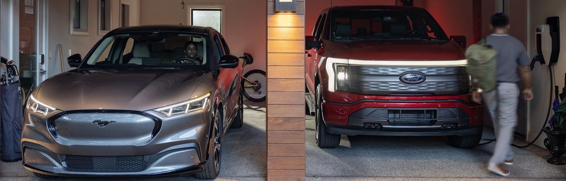 Man walking towards a F150 Lightning parked in the garage while a Mach-E is driving out of the garage with a woman behind the wheel