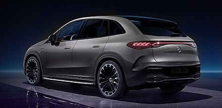 Rear view of a matte grey Mercedes-Benz EQA on a dark background