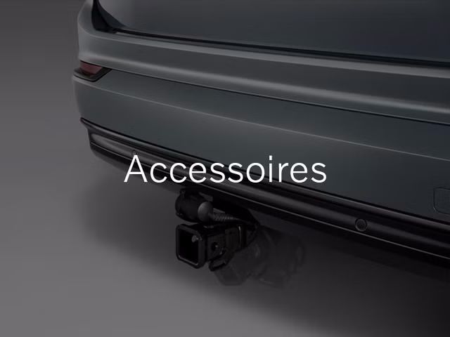 Un gros plan de l'écran tactile d'infodivertissement dans une Volvo, affichant les options de connectivité téléphonique et de médias. Le mot « Connectivité » est superposé sur l'image.