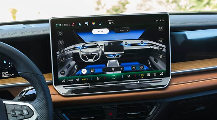 Large touchscreen displaying the climate control interface, with an illustration of the vehicle's interior and temperature settings.