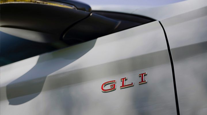 Close-up of the red GLI badge on the fender of the 2026 Volkswagen Jetta GLI.
