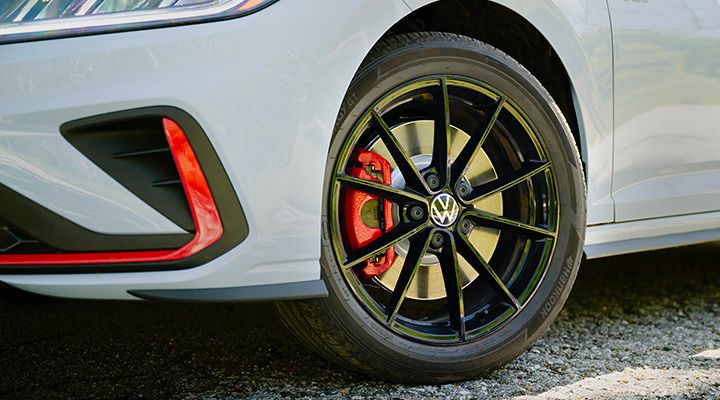 Close-up of a Jetta GLI sporty wheel with a multi-spoke design in black.