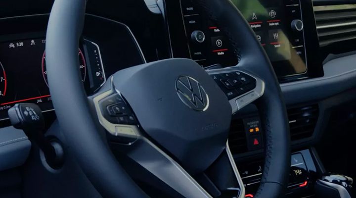 Close-up of the leather multi-function heated steering wheel in the Jetta .