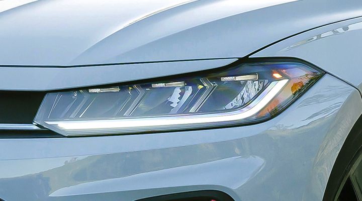 Close-up of the headlight on the Jetta GLI.