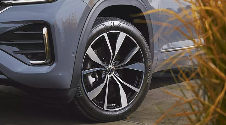 Close-up of the two-tone alloy wheel on a Volkswagen Atlas or Atlas Cross Sport, featuring Bridgestone tires.