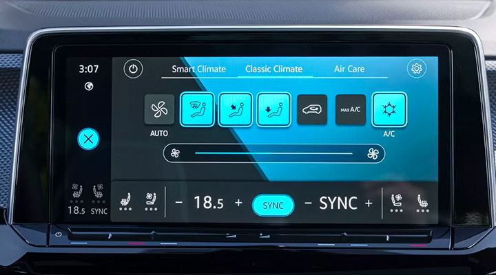 Close-up on the infotainment screen displaying the digital climate control interface, including "Smart Climate" and "Air Care" options.