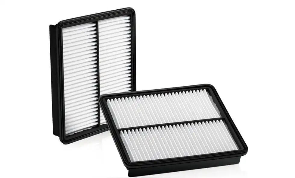 Two new, rectangular engine air filters with black frames and white pleated media, shown on a white background.