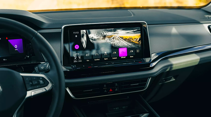 Infotainment screen displaying icons for different Drive Modes (Eco, Sport, Offroad, etc.) for off-road driving.