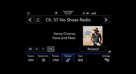 Infotainment screen showing the satellite radio (SXM) station "No Shoes Radio" playing Kenny Chesney.