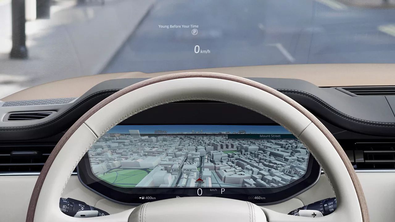Driver's view showing the digital instrument cluster and head-up display on the windshield.