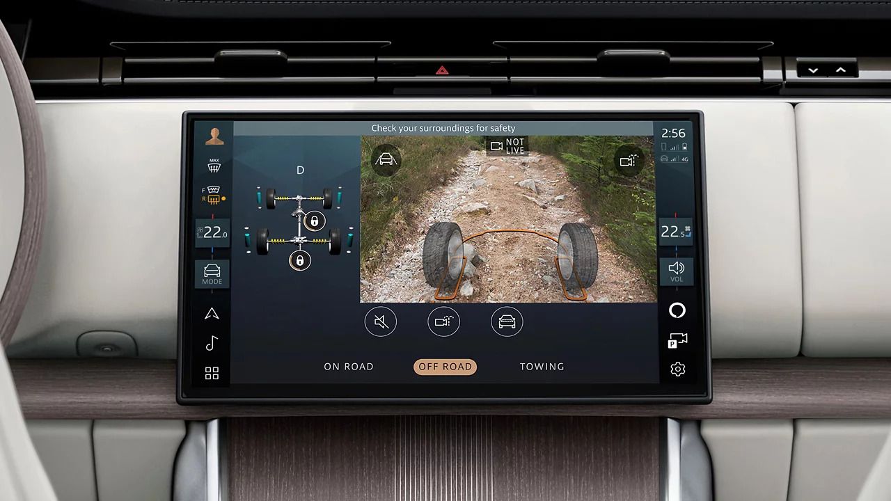 Central screen displaying cameras and chassis settings for off-road driving.