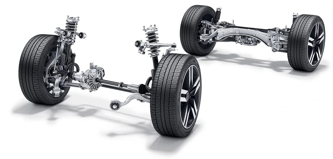 Technical diagram of front and rear car axles and suspension system isolated on a white background.