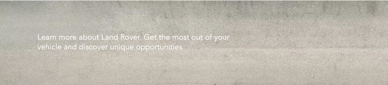 Text overlay on a textured, light grey background reads: 'Learn more about Land Rover. Get the most out of your vehicle and discover unique opportunities'.