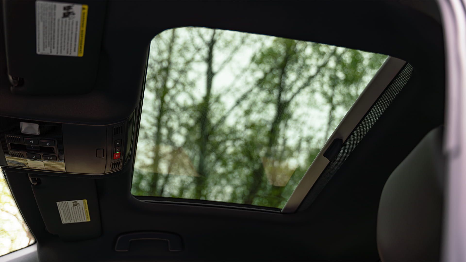 2027 Volkswagen Jetta panoramic sunroof with view of tree canopy