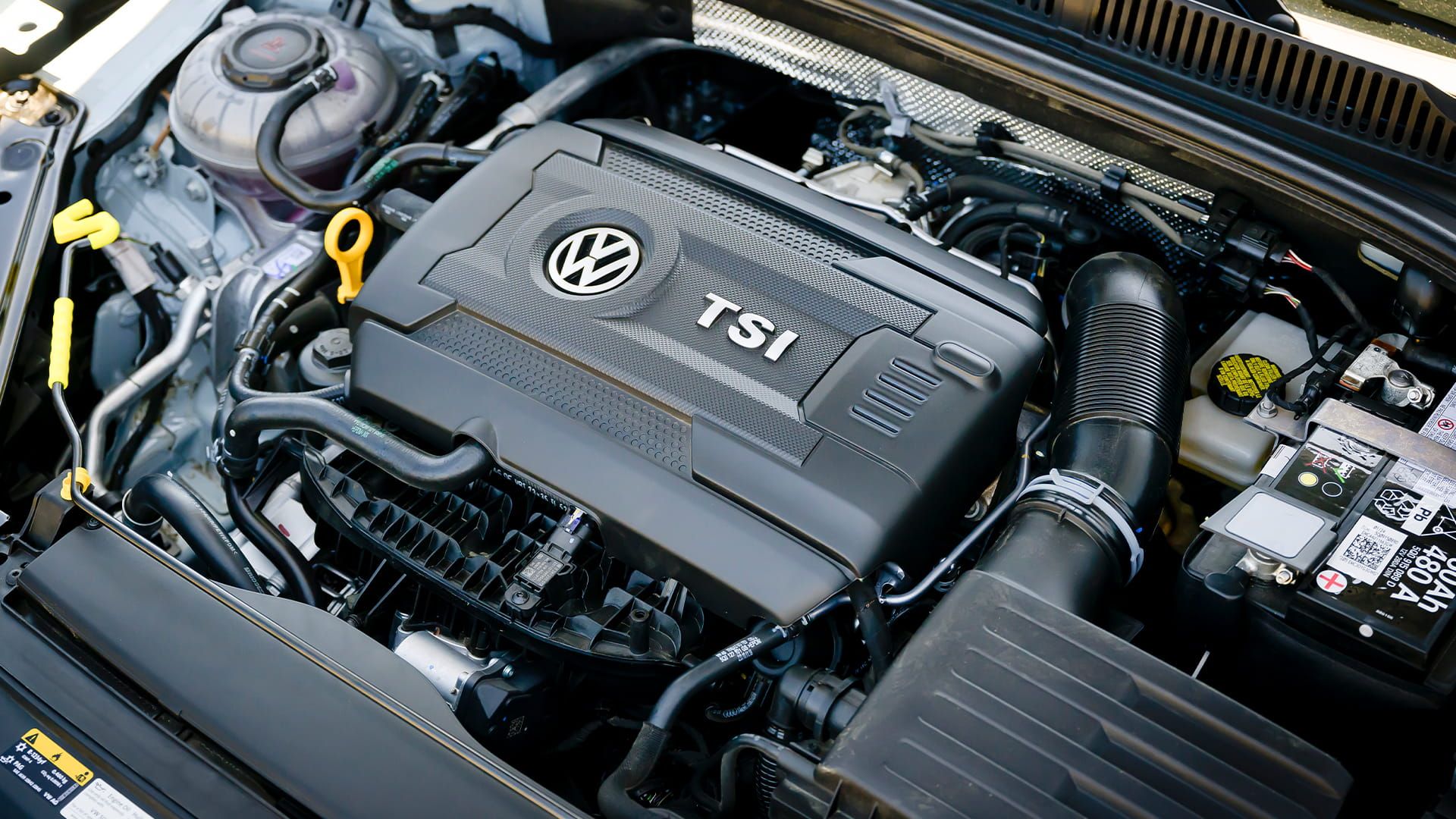 Jetta GLI engine bay featuring a TSI engine with clean, compact layout.