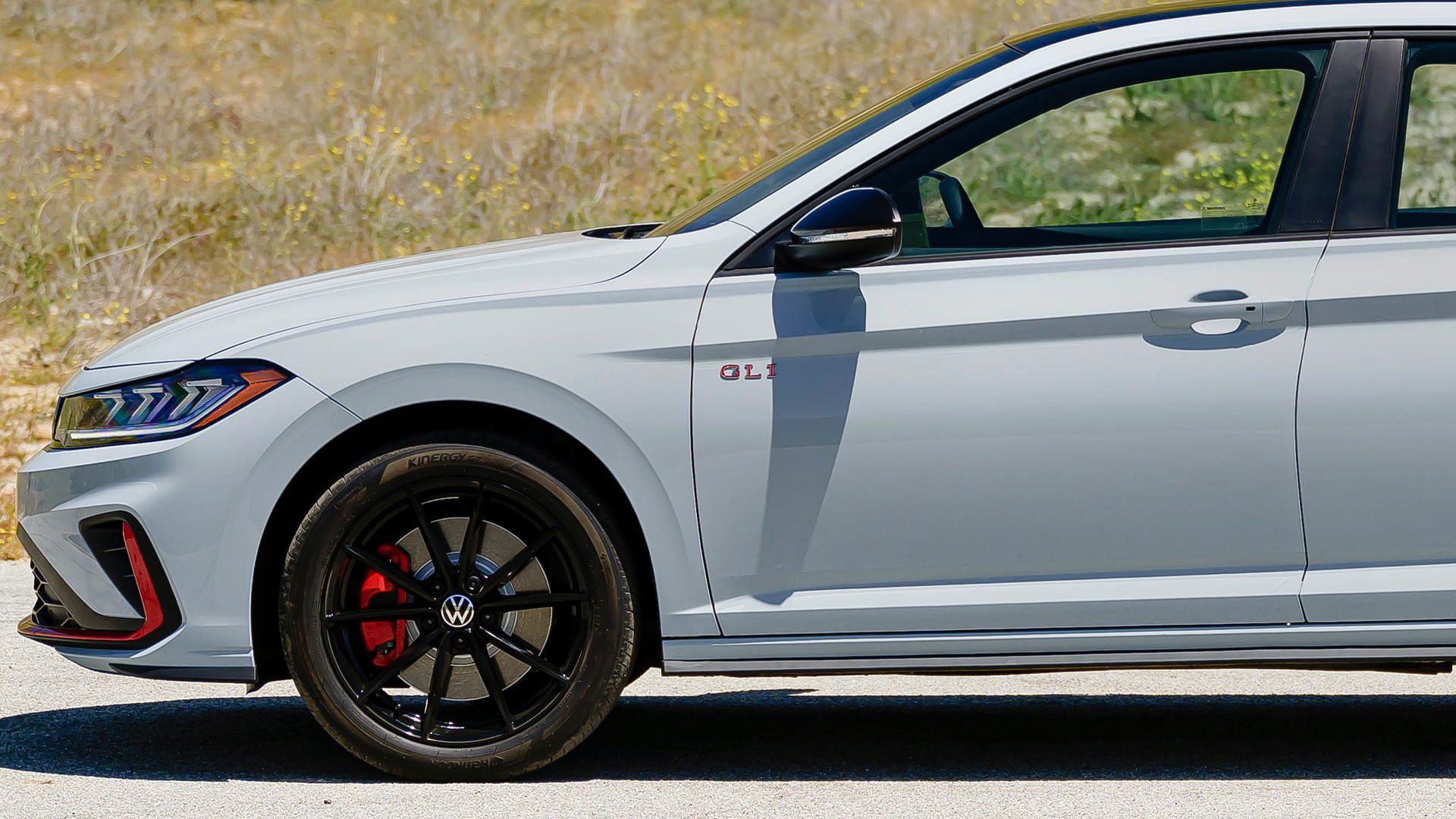Side view of the Jetta GLI door with body- colour mirror and GLI badge.