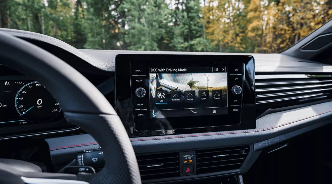 Jetta GLI dashboard with touchscreen infotainment system and digital cockpit display.