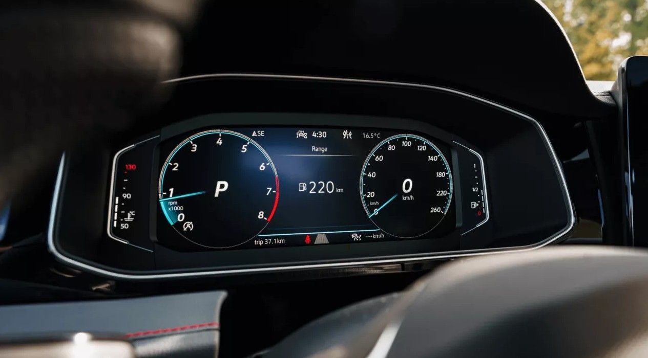 Digital instrument cluster in the Jetta GLI displaying speed, drive mode, and performance details.