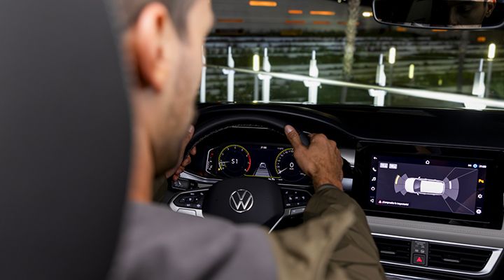 View of the 2026 Volkswagen Taos interior showing Park Distance Control on the dashboard screen.
