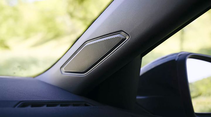 Close-up of the 2026 Volkswagen Jetta front pillar with VW Premium Audio speaker