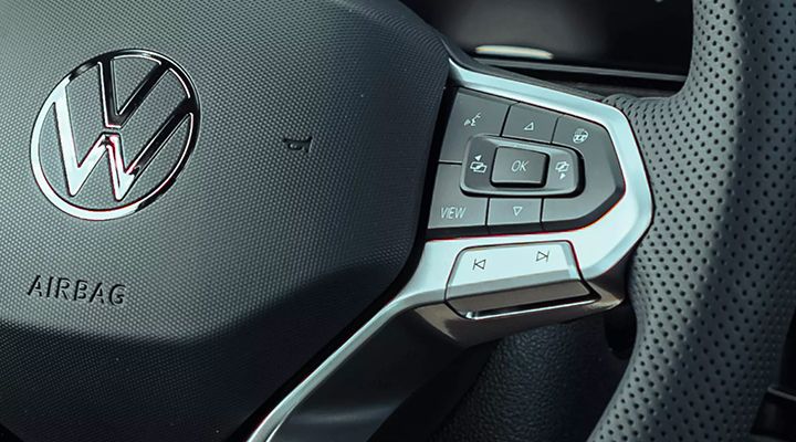 Close-up of the multifunction controls located on the right side of the Golf GTI steering wheel.