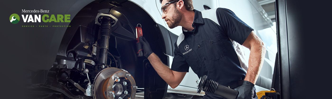 Mercedes-Benz VanCare technician inspecting brake assembly