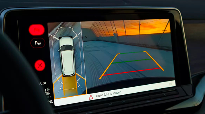 Infotainment screen displaying the Area View 360-degree camera and rear-view parking assist perspective.
