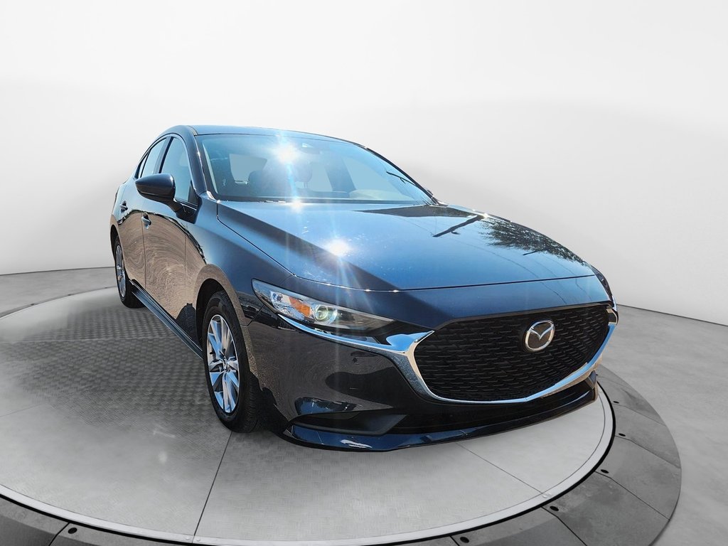 2023 Mazda 3 in Baie-Comeau, Quebec - 2 - w1024h768px