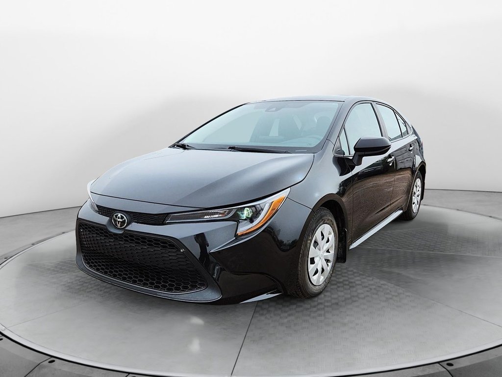 2021 Toyota Corolla in Baie-Comeau, Quebec - 1 - w1024h768px