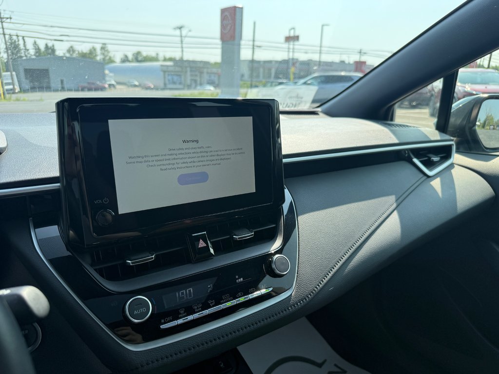2023 Toyota COROLLA HYBRID SE AWD in Bathurst, New Brunswick - 13 - w1024h768px