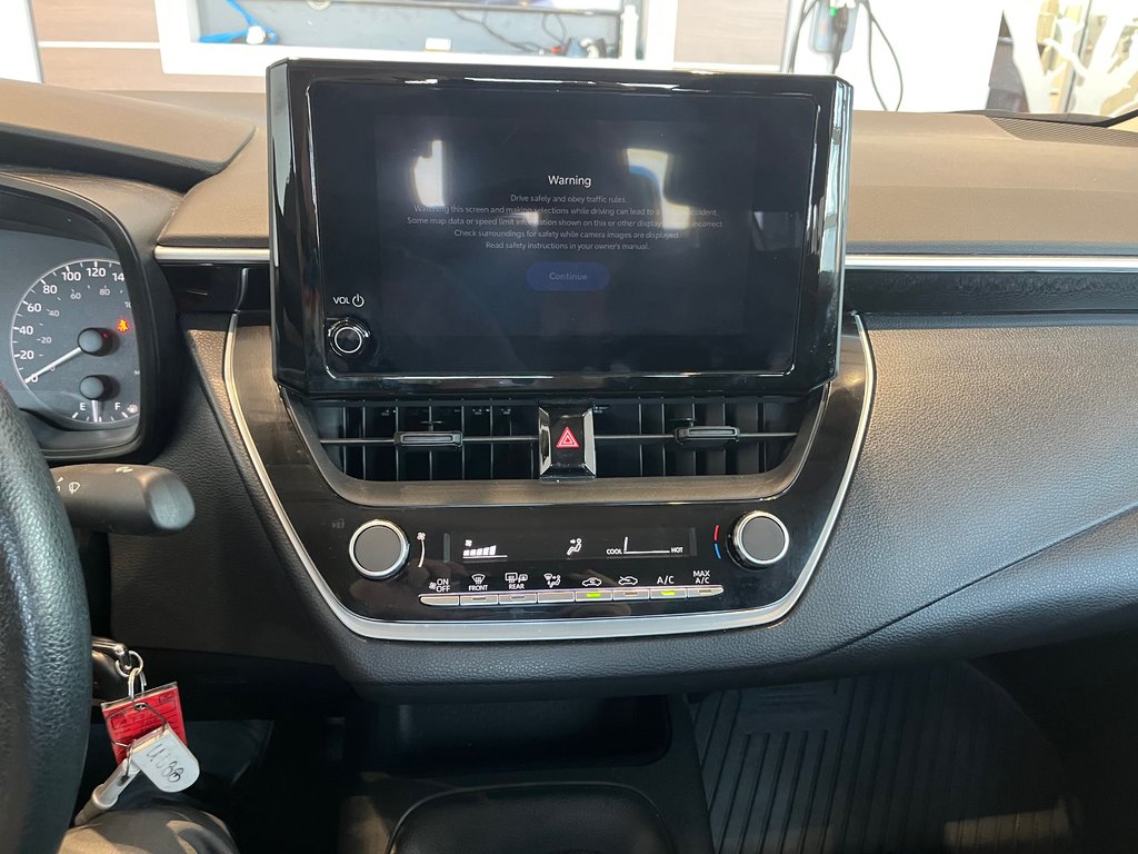 2023 Toyota Corolla L in Amos, Quebec - 11 - w1024h768px
