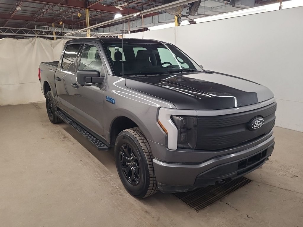 Ford F-150 Lightning XLT SuperCrew 4x4 Navigation 2025 à St-Jean-Sur-Richelieu, Québec - 2 - w1024h768px