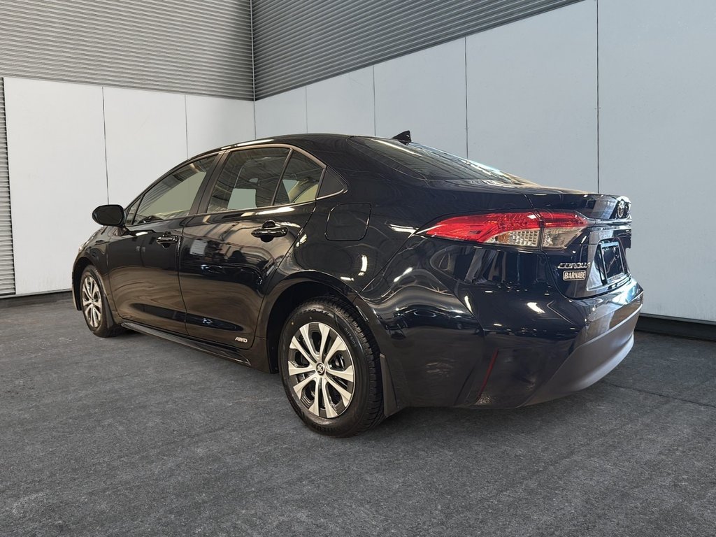 2025 Toyota Corolla LE HYBRID AWD in St-Jean-Sur-Richelieu, Quebec - 4 - w1024h768px