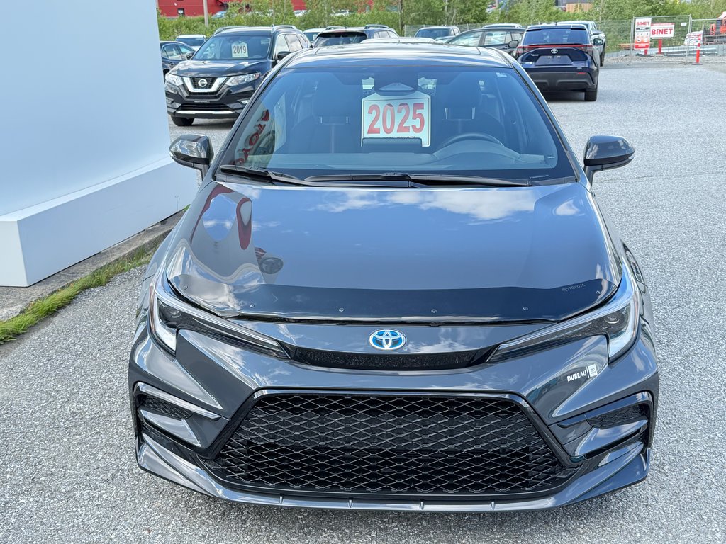 2025 Toyota Corolla HYBRIDE SE AWD / 8500 KM / PEA 08-09-29=100KM / in Thetford Mines, Quebec - 2 - w1024h768px